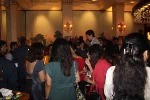 1911 Bar full of members enjoying the bubbly with snacks and meeting friends